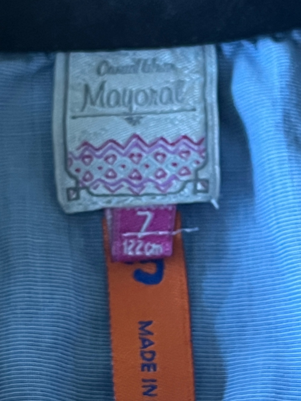 Girls denim dress size 7 brand is Mayoral
